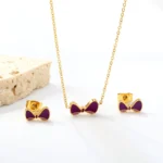 Purple bow gold jewellery set Kenya - necklace and earrings